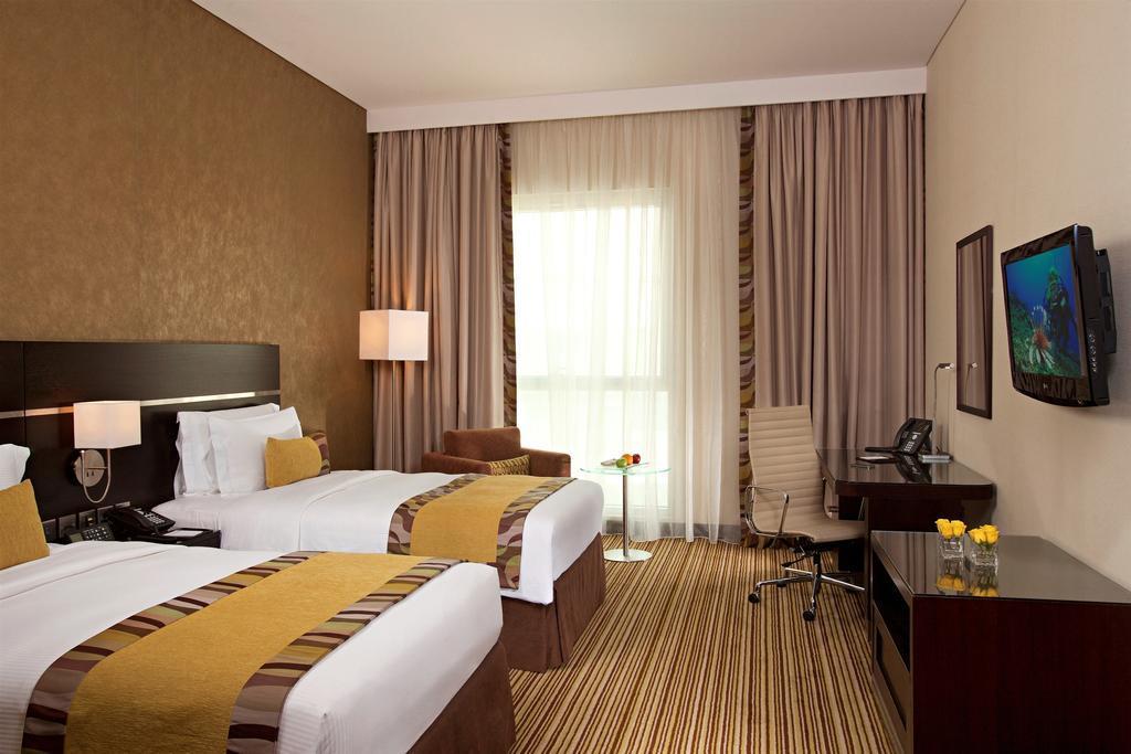 Hyatt Regency Oryx Doha Hotel Exterior photo A room at the hotel